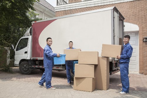 Removal van and moving team in Camberwell street setting