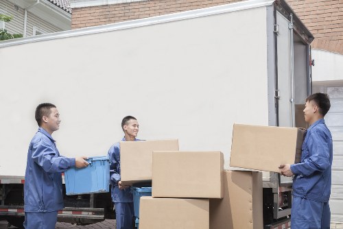 Careful packing and wrapping of fragile items for a home removal