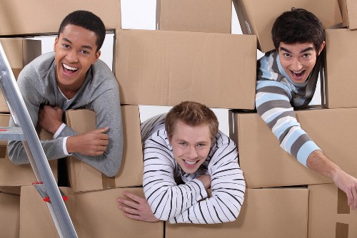 Moving team preparing items safely for transport