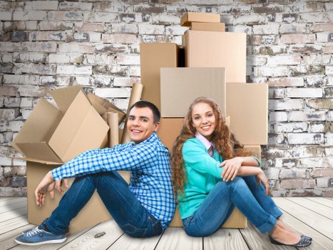 Loading a van with household goods and furniture for South London relocation