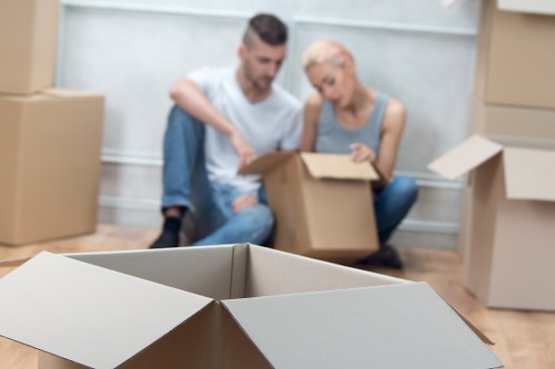 Packed boxes and fragile items ready for removal van transport