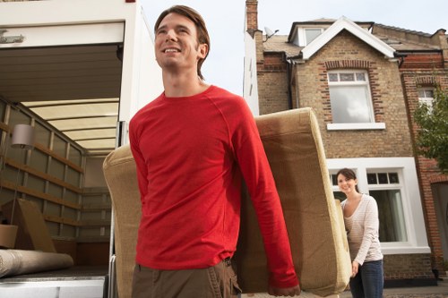 Team collecting unwanted household furniture in Camberwell