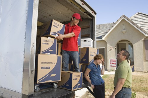 Professional movers loading items into a van in Camberwell