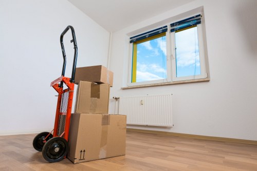 Experienced movers loading a grand piano safely in Camberwell