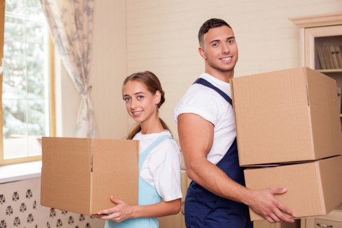 Moving team handling boxes and furniture for a Camberwell relocation