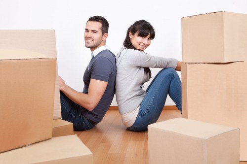 A moving team preparing boxed items during packing and unpacking services in Camberwell