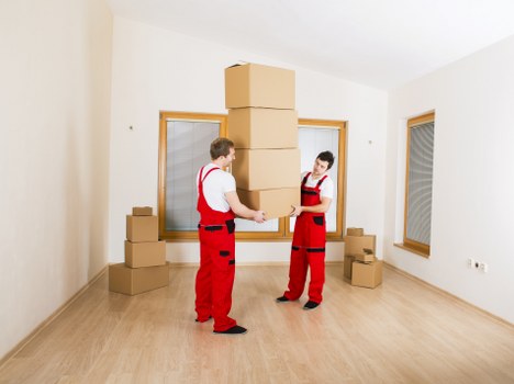 Moving boxes and household items with a van in Camberwell